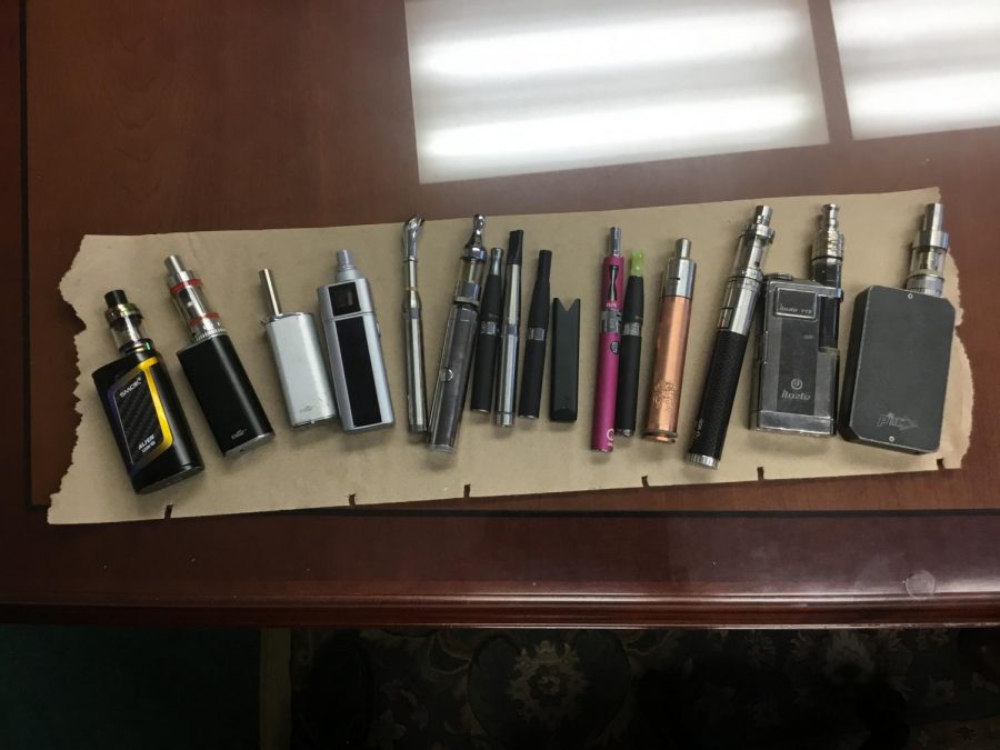 A+wide+variety+of+juuls%2C+junos%2C+mods%2C+and+vape+pens.+These+are+all+used+by+Ms.+Kaiser+to+demonstrate+the+use+and+dangers+of+vaping.