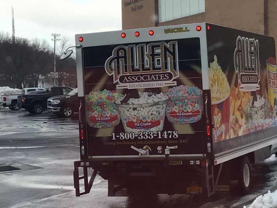 This is the vendor for Mini Melts Ice Cream, Allen Associates. They are leaving after restocking the vending machine at McQuaid Jesuit High School.
