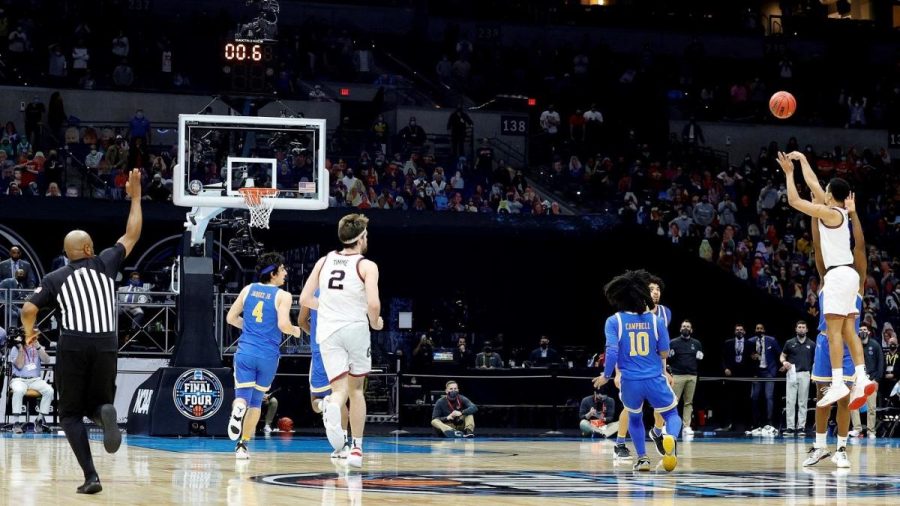INDIANAPOLIS, INDIANA - APRIL 03: Jalen Suggs #1 of the Gonzaga Bulldogs shoots a game-winning three point basket in overtime to defeat the UCLA Bruins 93-90 during the 2021 NCAA Final Four semifinal at Lucas Oil Stadium on April 03, 2021 in Indianapolis, Indiana. (Photo by Tim Nwachukwu/Getty Images)