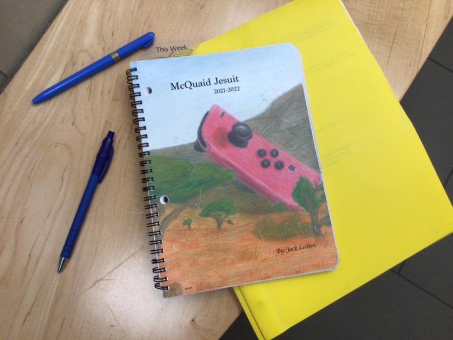 The student artwork on the cover of the 2021-2022 McQuaid agenda was inspired by a video game controller. 